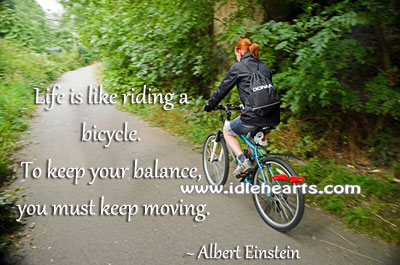 Life is like riding a bicycle. Albert Einstein Picture Quote