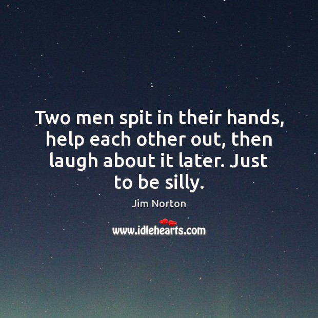 Two men spit in their hands, help each other out, then laugh Image